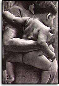 Native Mexican Baby in parent's arms
